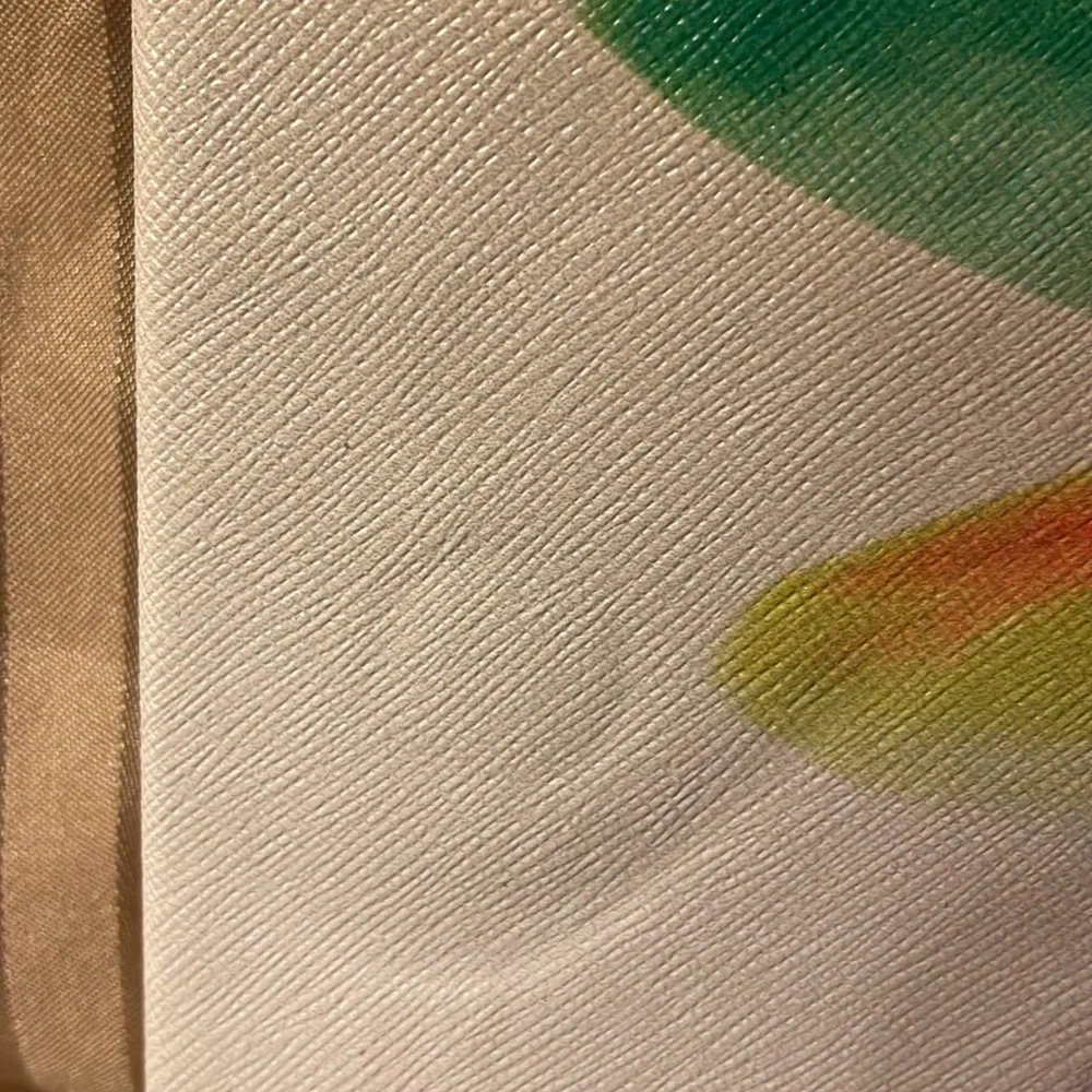 Floral pink colored tablet cover- not sure what type tablet fits in it.